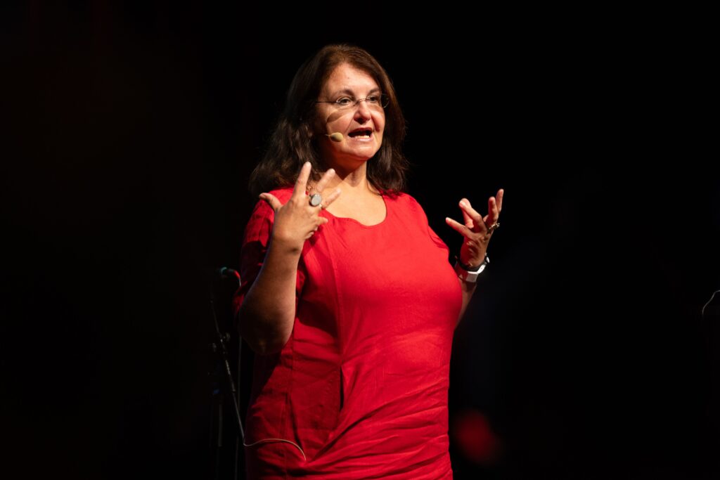 Prof Dr Gabriele Berg giving her keynote speech at the 2025 World Ethic Forum public event.