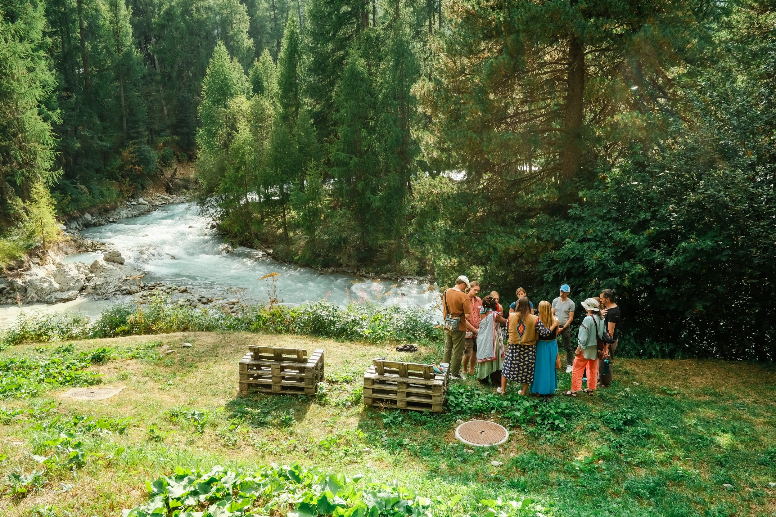 A group of WEFo Firekeepers next to a river during the 2024 Firekeeper Gathering.